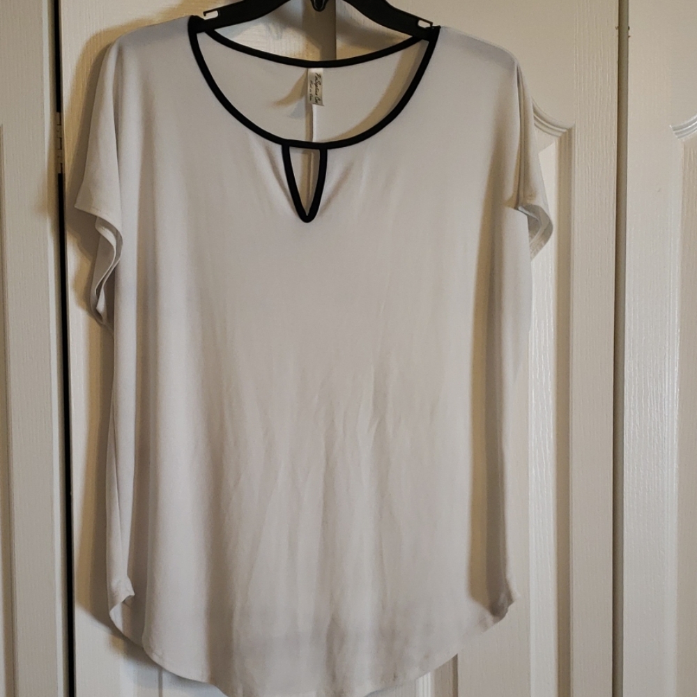 White blouse with black trim | L